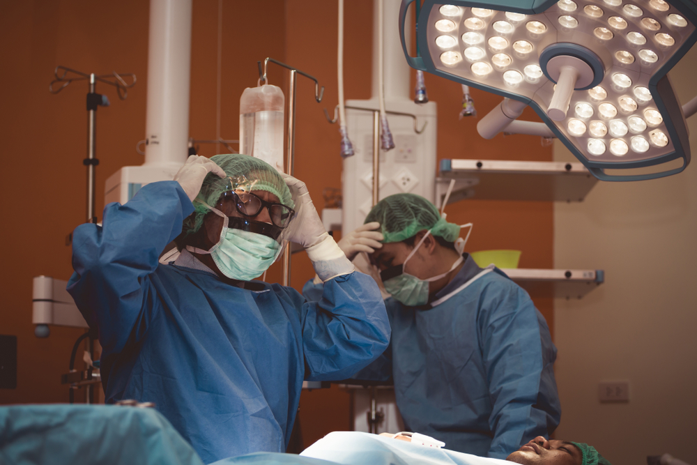 Mistake or Depressed Team surgeon at work on operating room in hospital