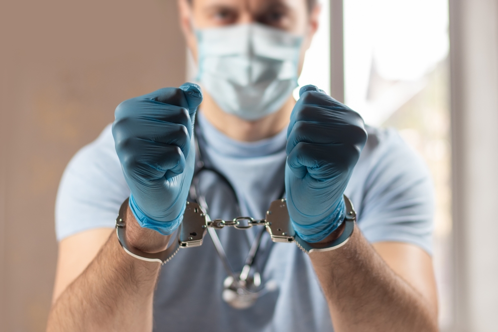 The handcuffed doctor